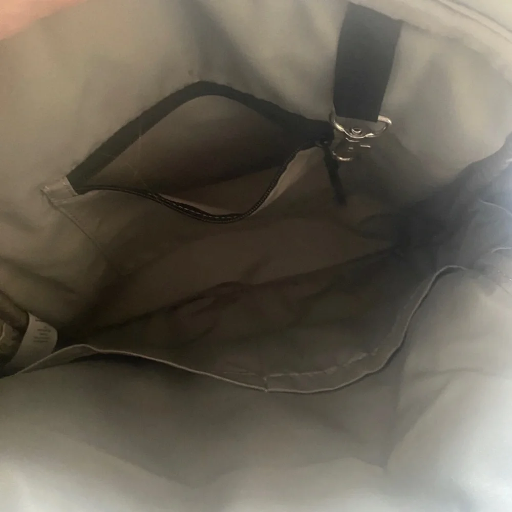 Petunia Pickke Bottom convertible embossed backpack purse / diaper bag